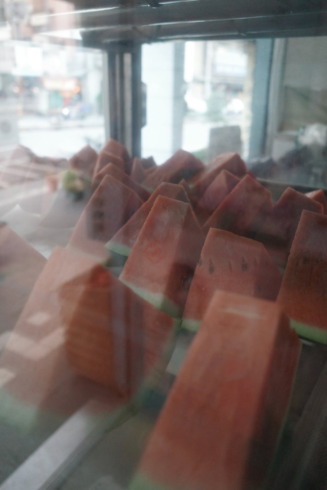 Watermelon slices in a fridge